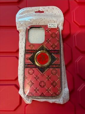 Source Unknown Pink Phone Case with Gold Ring Grip and Decorative Pattern